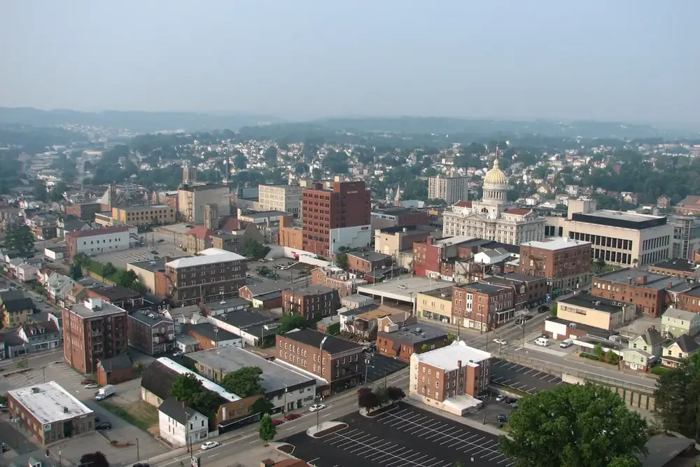 Aerial view of downtown Greensburg with the courthouse dome and surrounding brick buildings in Pennsylvania
